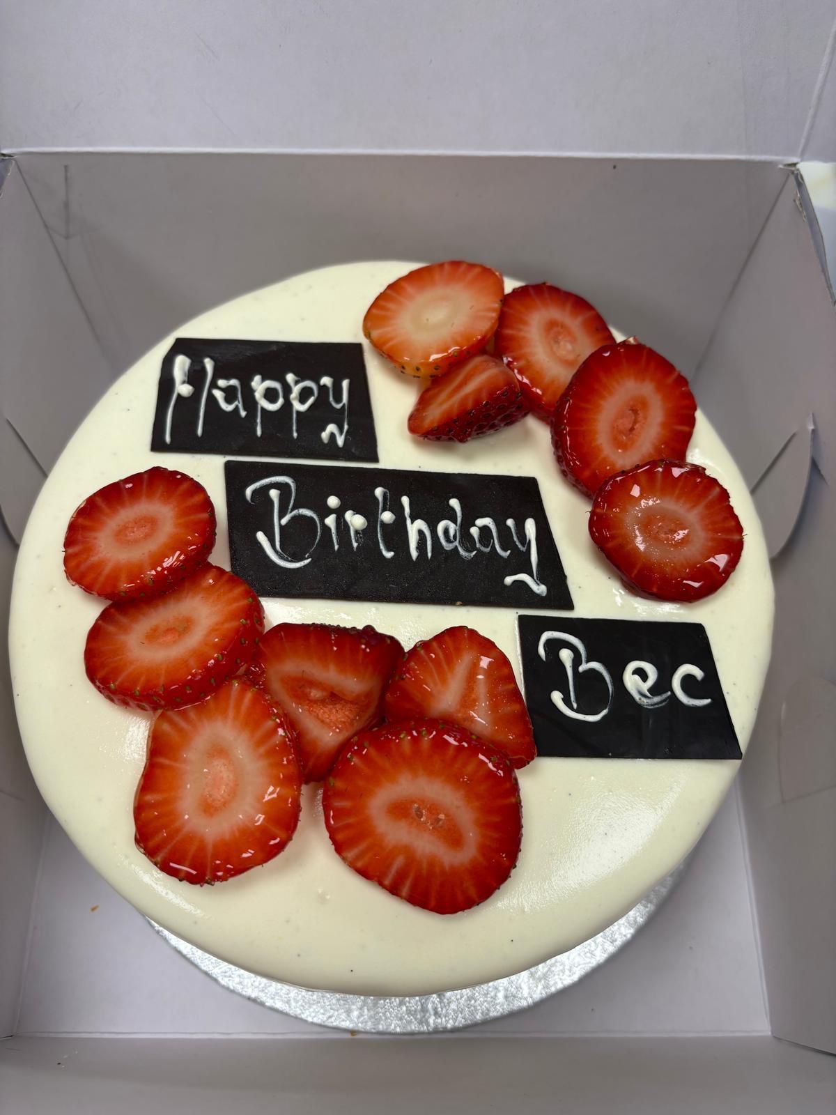 Strawberry-topped birthday cake